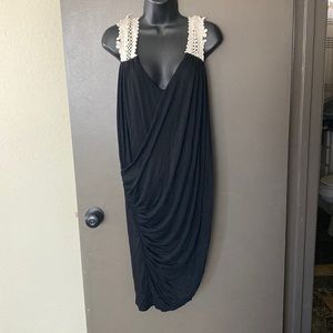 Black dress size 4 with cream colored crocheted shoulder straps